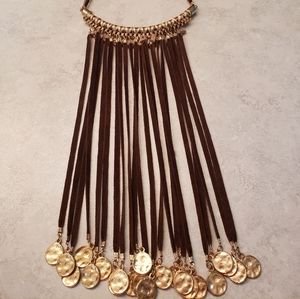 Beautiful and unique brown and gold necklace with beads and gold "coin" details.